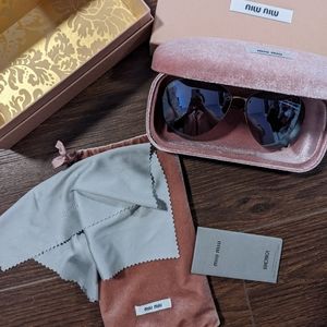 Miu Miu purple tinted sunglasses